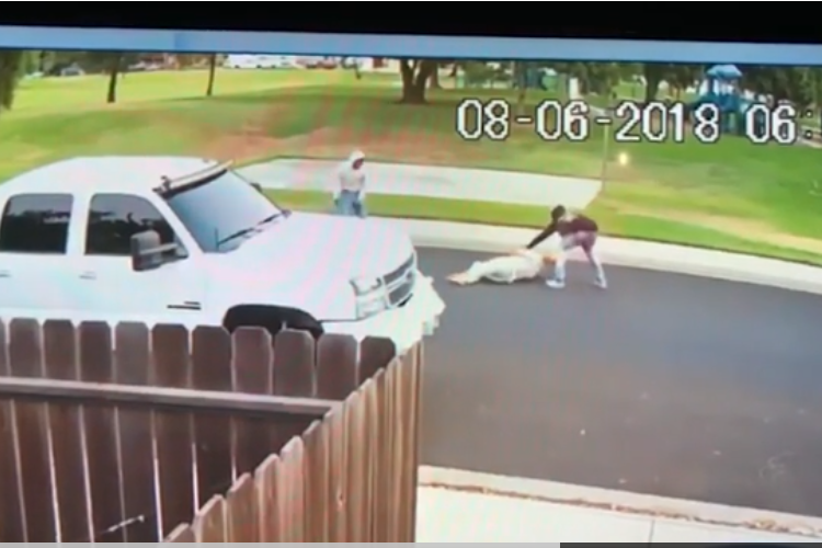 A still from a surveillance video showing two men attacking Sahib Singh Natt.